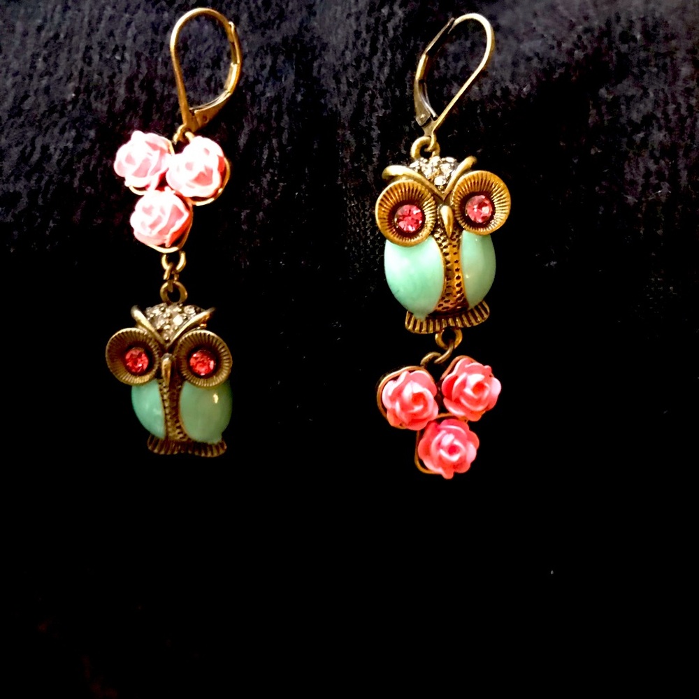 Earrings by Betsy Johnson.